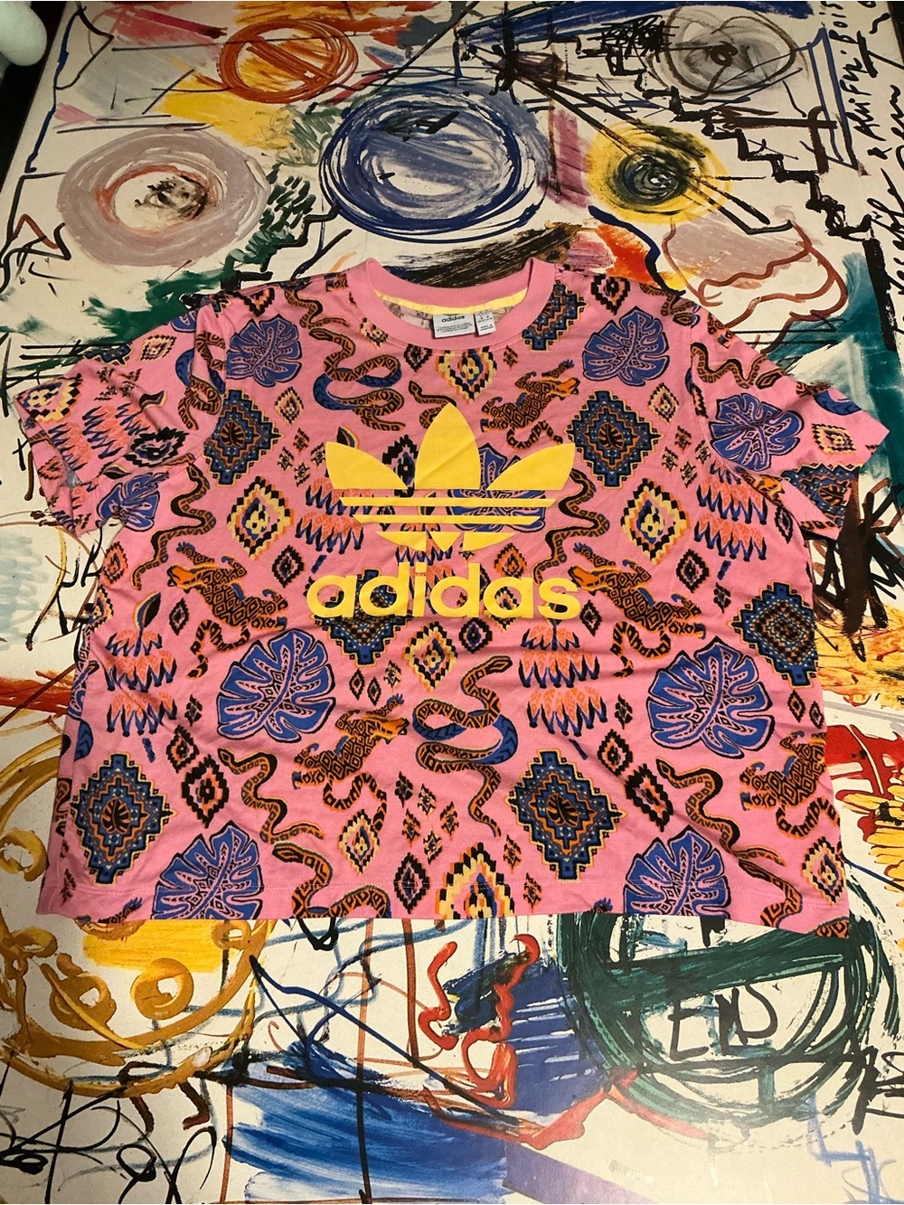 adidas Pink Tee with Yellow Logo and Blue Graphic Pattern